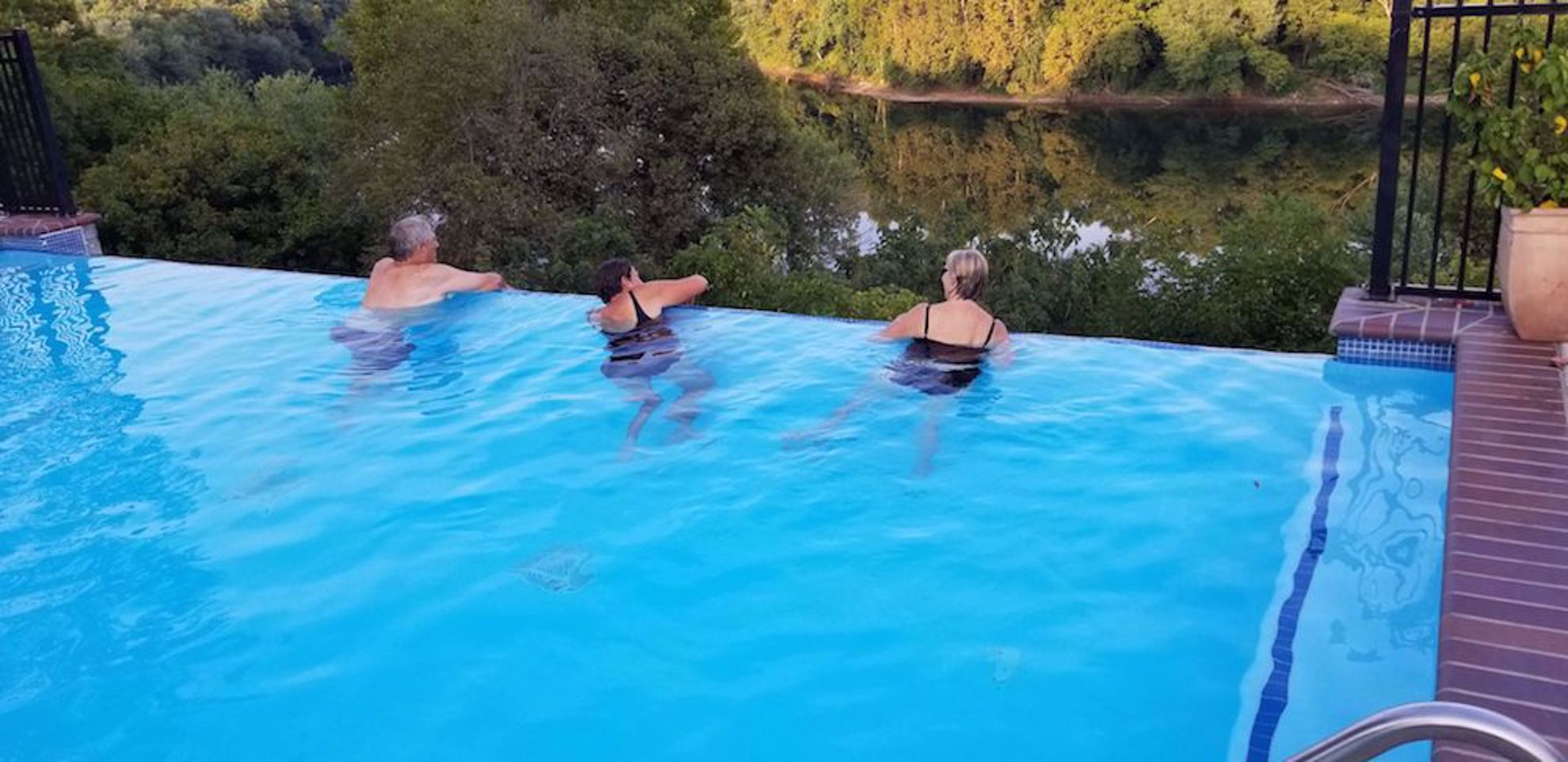 Infinity pool and river at Bavarian Inn