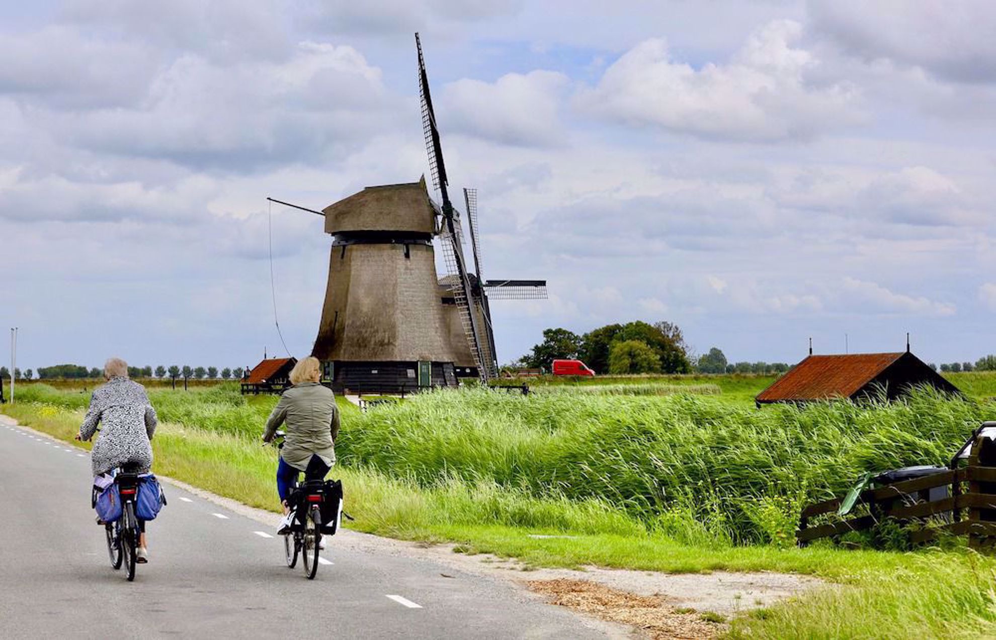 Cyclists and windmill
