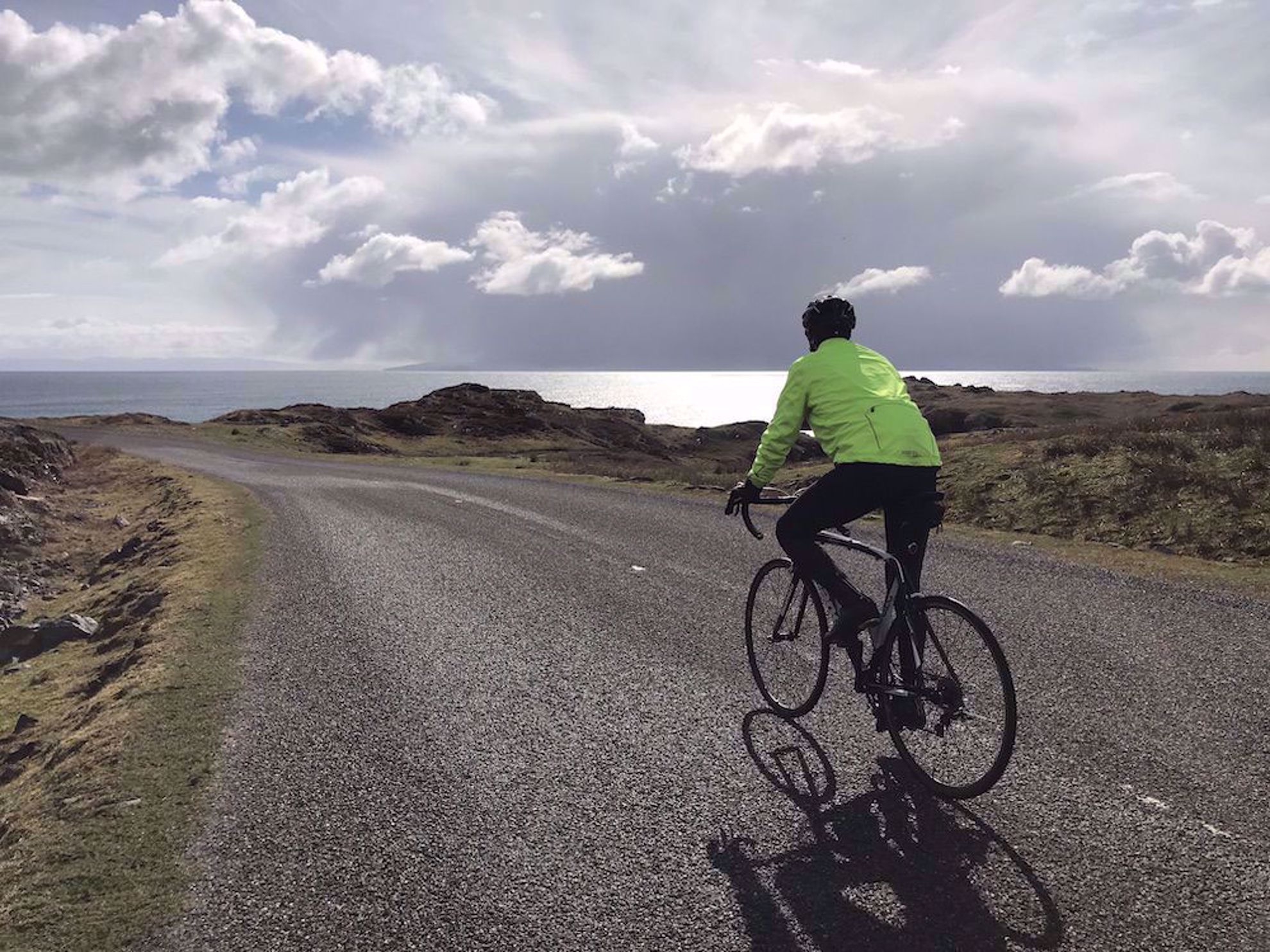 Cyclist along the Outer Hebrides shore