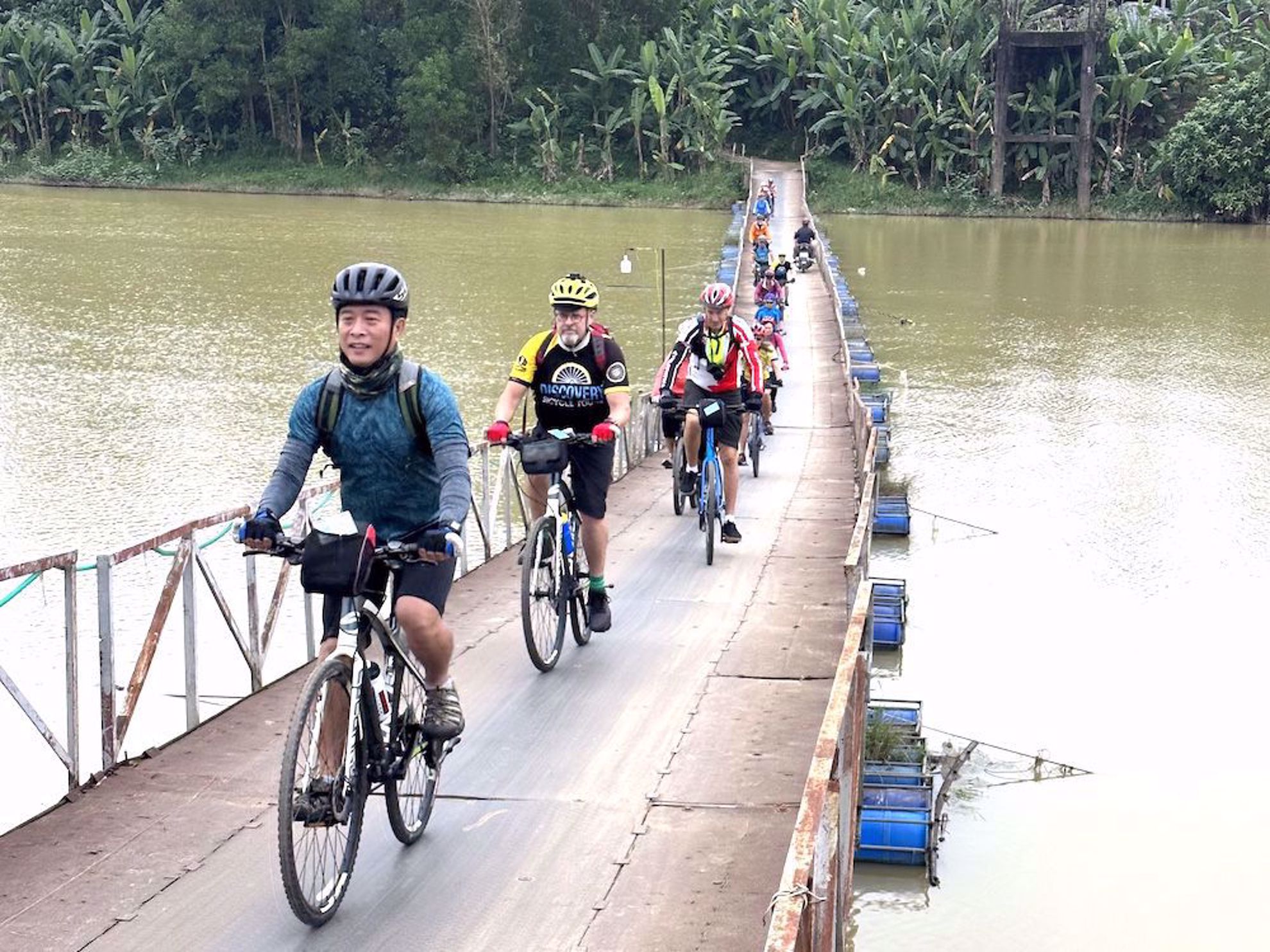 Crossing a Vietnam river on floating bridge